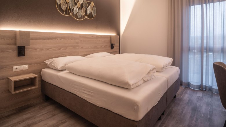 Schlafzimmer, © BAWU HotelbetriebsgmbH, Fotograf Petr Dobias